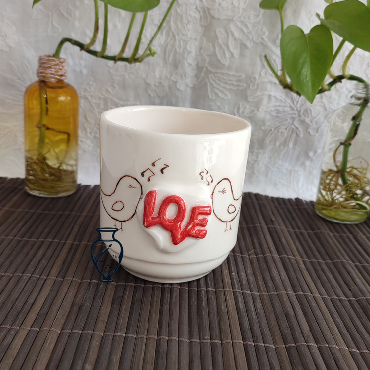 ماگ نقش برجسته love و پرنده_ ماگ سرامیکی دستساز نقش برجسته love